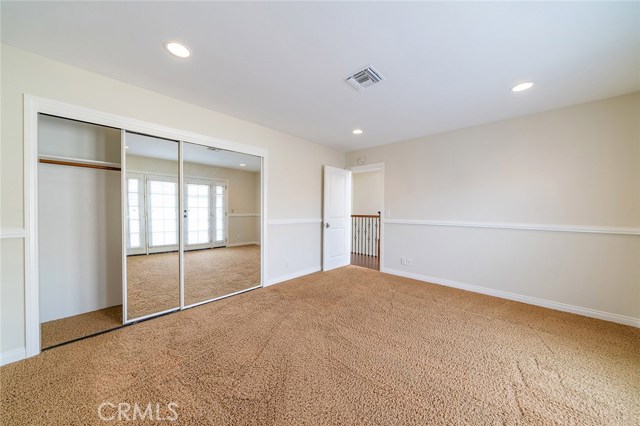 Large closets and recessed lighting throughout.
