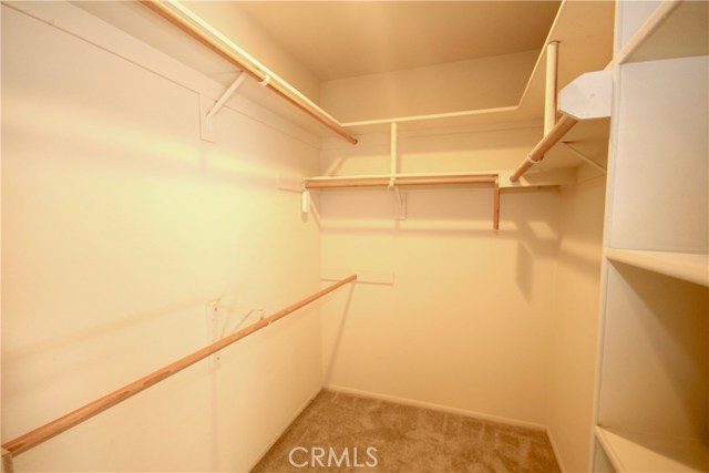 One of two spacious master closets