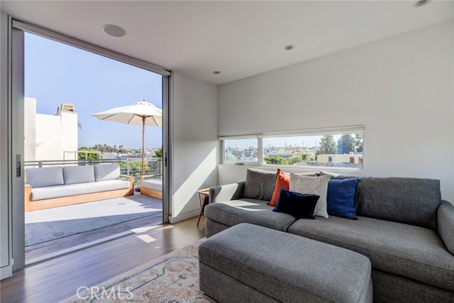 Den and deck with views