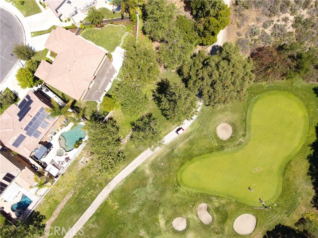 The view from above highlights proximity to the golf course plus the privacy of the location