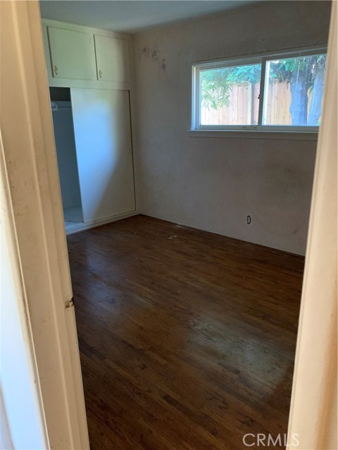 Bedroom with Hardwood Flooring