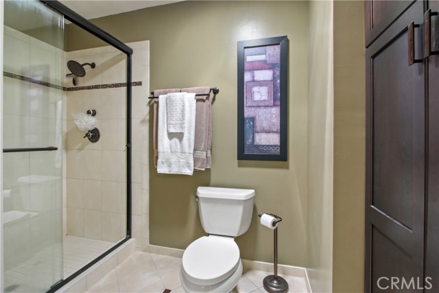 Mather bath shower/commode area with added storage and solatube for added natural light. Mather bath shower/commode area with added storage and solatube for added natural light.