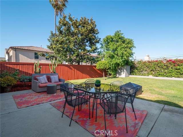 Step out to this gorgeous backyard oasis; large entertaining patio space for outside living and dining areas and large grass area.