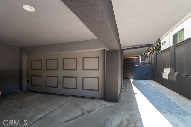 2 car attached garage. Guest parking spot that is shared with 620 and the front unit, 618.