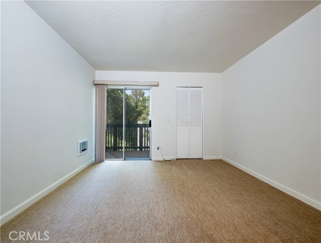 Master suite with new plush carpet, large baseboards, two closets- one walk in and one wall closet and its own large renovated bathroom.