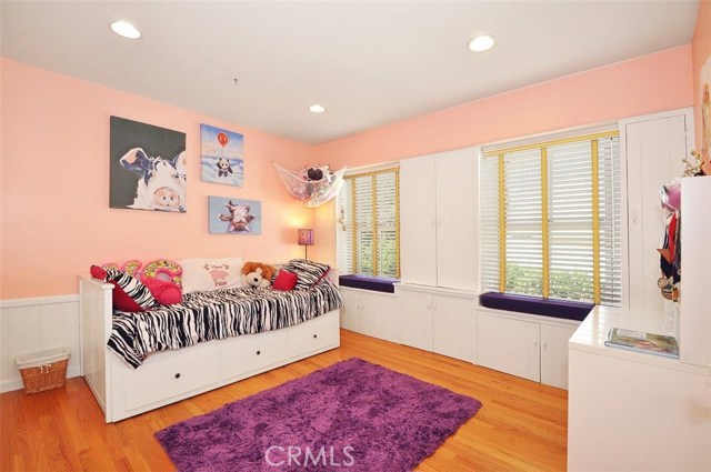 Upstairs Bedroom with charming original Cabinetry