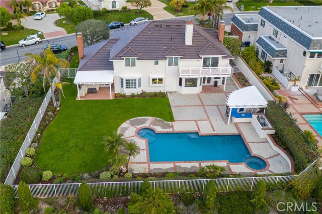 What an awesome estate!  Pool, spa, huge patio, tons of grass, and a big outdoor kitchen + views!!!!