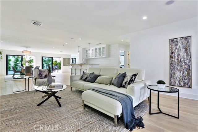 The Living Room space will accommodate a Large Sectional and Seating for Entertaining, Relaxing and Watching a Large Wall Mounted Flat Panel Television.