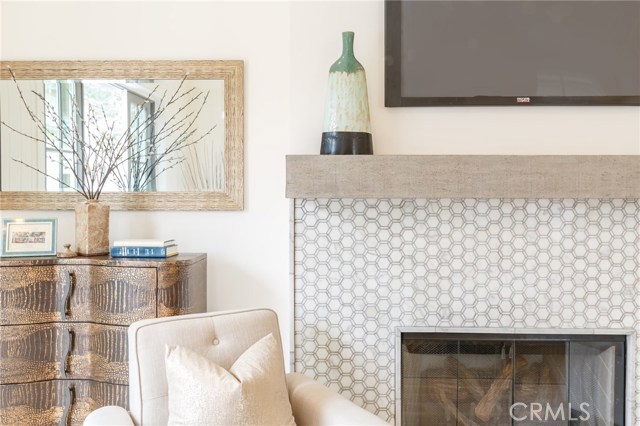 master bedroom marble tiled fireplace