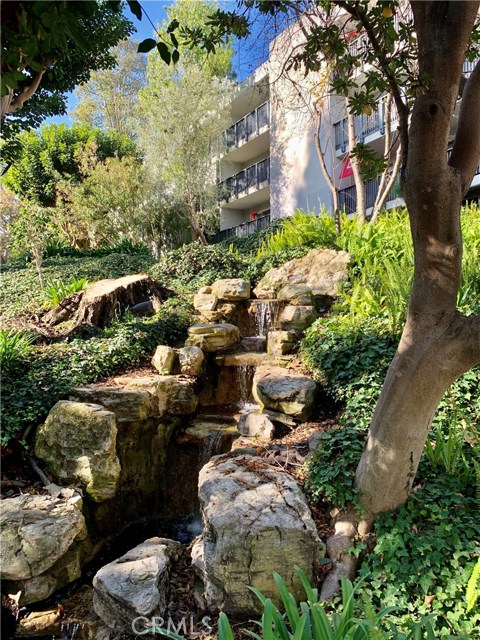 Building facade with waterfall feature