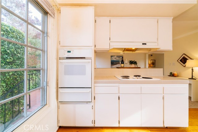 The bright and functional kitchen that it open to the family room and dining area has the potential to be a spectacular living space.