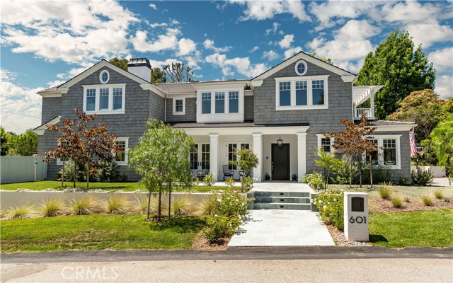 Large front patio for enjoying the sunset and neighborhood views