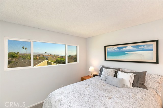 Master bedroom with views of Palos Verdes Coastline, and Catalina Island.