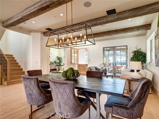 Trestlewood solid reclaimed wood beams and ceiling accents, white oak flooring, huge open floor plan, LaCantina door systems for indoor/outdoor feel, surround sound throughout home.  Crestron whole home automation.