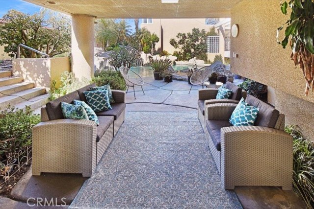 Covered Patio between Family Room & Pool