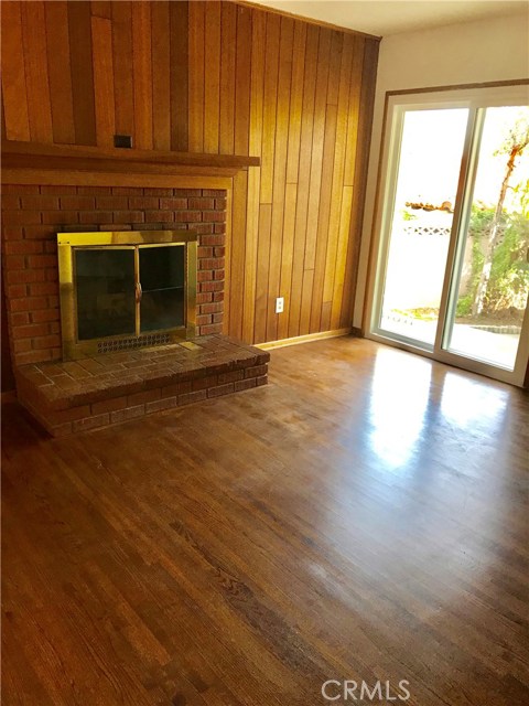 Den or third bedroom - hardwood flooring - brand new sliding glass door