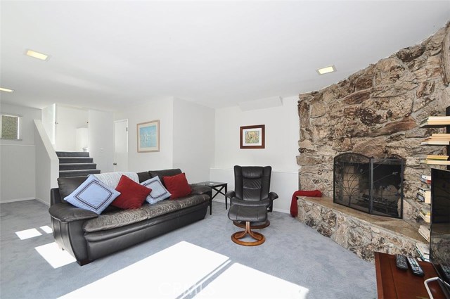Family room with PV stone fireplace on the lower level