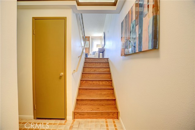 Entry level to garage and powder room, tile flooring. Entry level to garage and powder room, tile flooring.