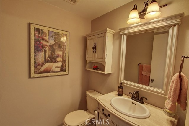 Updated half bath conveniently located downstairs.