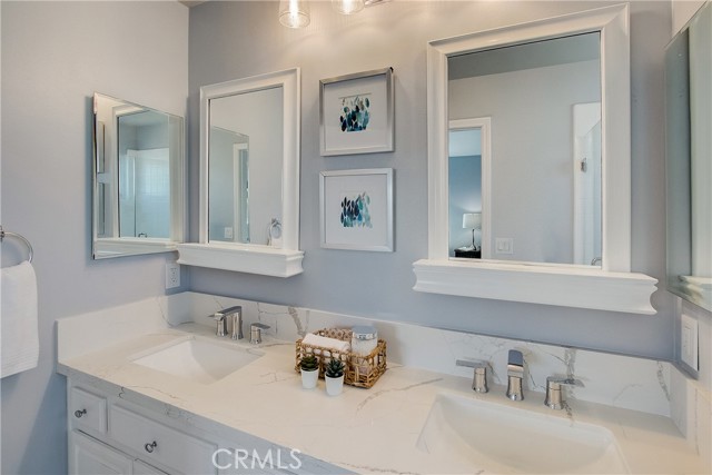 Newly freshened up Primary bathroom with Quartz counter tops and double sinks!