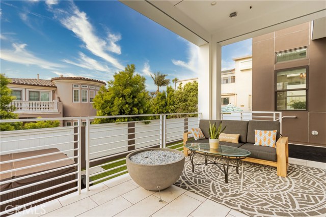 Rear patio entertaining barbque  and glass fire pit area