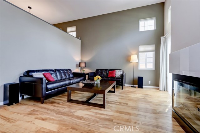 Soaring ceilings in this spacious living room.