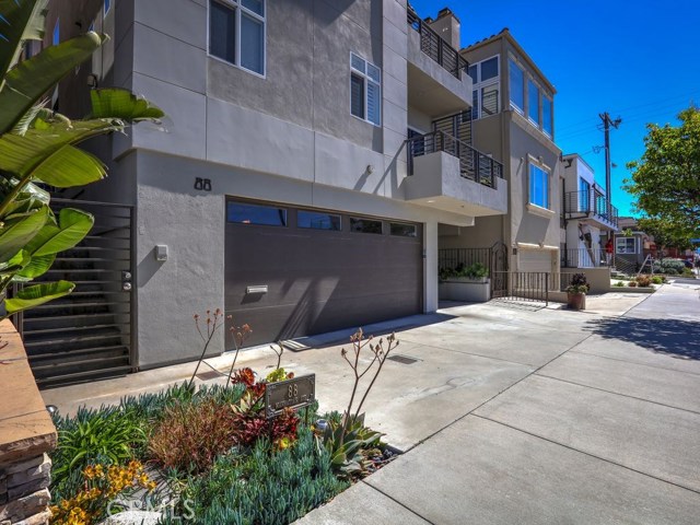 Secure gate to front door, direct access two car garage and side spot for third car or guest.