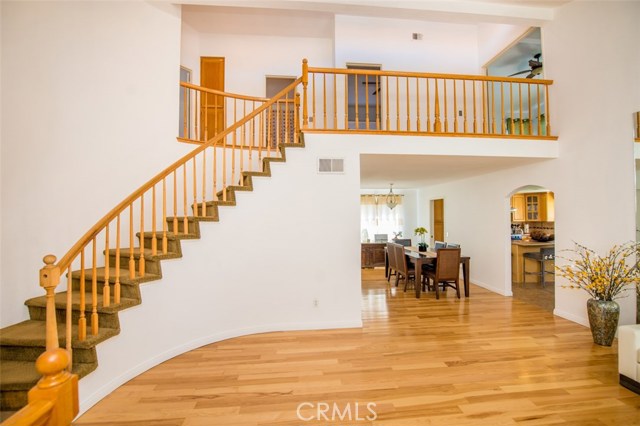 Large living room with balcony overlooking the home.