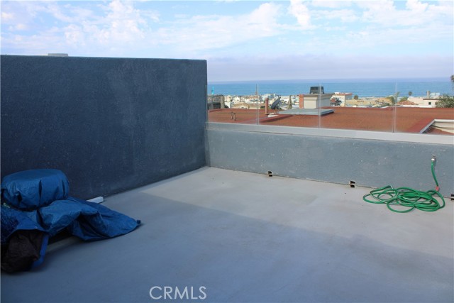 Large deck with views of sand and surf