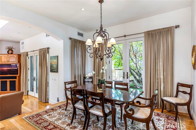 Formal dining area with access to the private patio - new Andersen french doors.