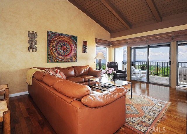 Family room open to the kitchen with great view.