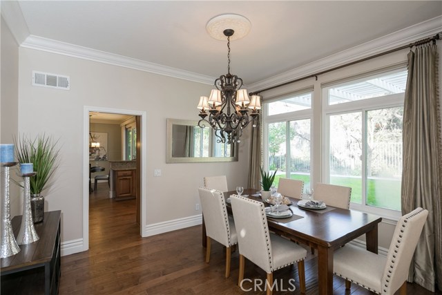 Dinning area with view of tranquil backyard.