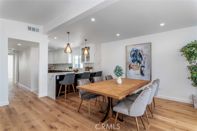 Dining area and kitchen, within conversing distance.
