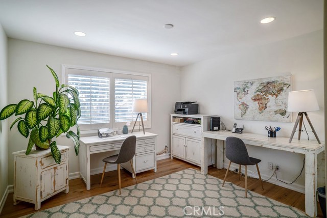 Entry level Bedroom #1 currently used as a work from home office area.