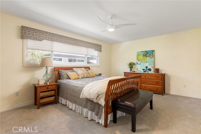 Main bedroom has brand new carpeting, large window and 13.5' wardrobe closet. Bedroom also has a desk area and its' own remodeled bathroom.