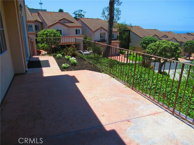 Downstairs Patio off of Living Room, Dining Room and Breakfast Area with Ocean view.