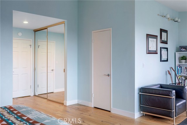 A walk-in closet and a mirrored slider closet - again, so much storage!