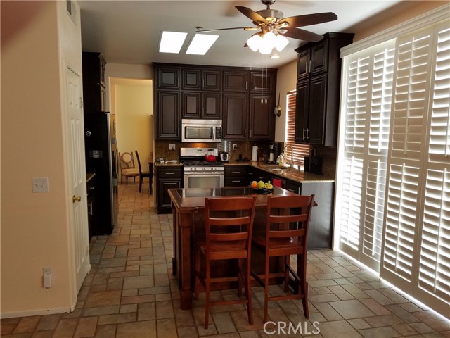 Plantation Sliding Shutters Leads Out To The Back Yard Patio.