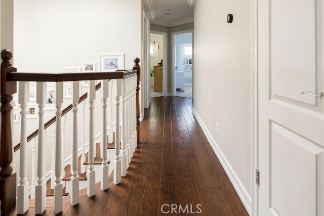 Upstairs hallway with hardwood floors