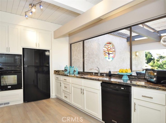 Kitchen overlooking atrium/balcony