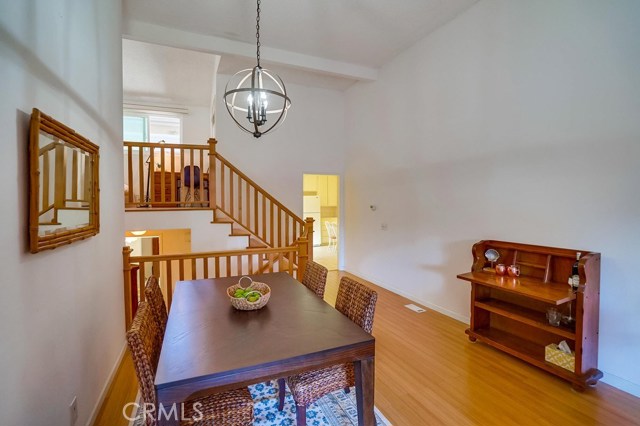 The dining area has vaulted ceilings