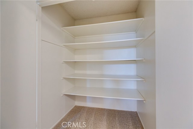 There are many storage closets throughout the home. This one is the largest and is upstairs in the main hallway and includes built in shelving