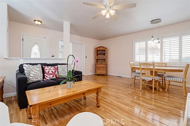 View from the living room, looking at the front door and dining room