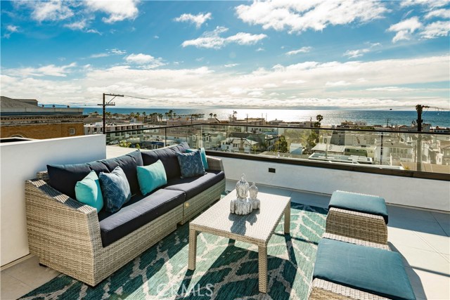 Roof top deck with view of ocean
