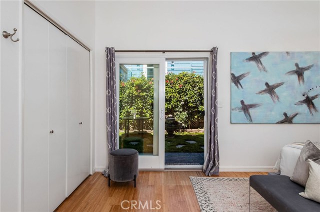 First floor bedroom looking at the fresco patio.. green and serene. Imagine midnight at your oasis.