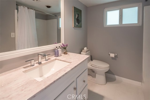 Upstairs full bathroom features brand new vanity, sink and faucets. Ceramic bathtub - perfect for bathing toddlers.