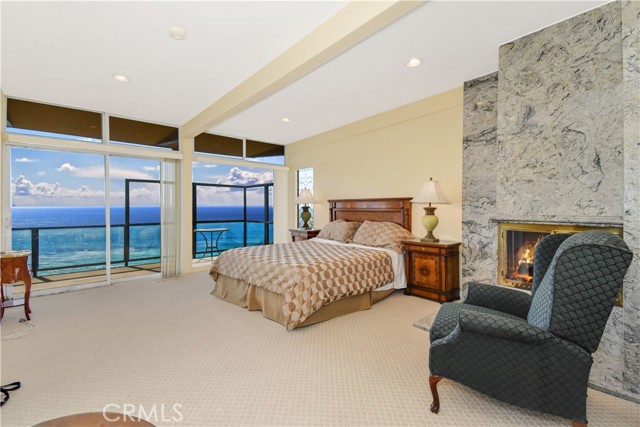 Wake up to amazing views every morning from this large master suite with fireplace.