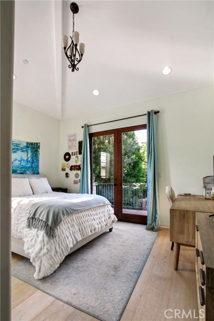 Upstairs bedroom with cathedral ceilings