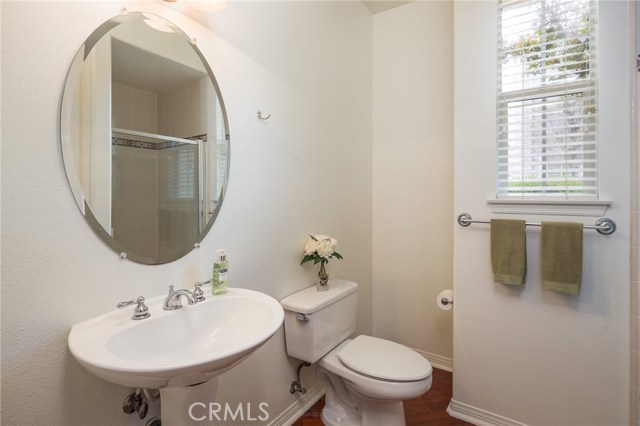 Downstairs bathroom with stall shower