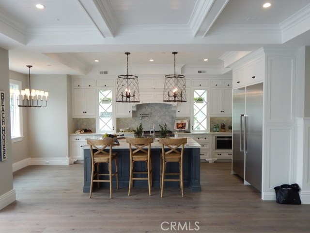 Gourmet Kitchen with Center Island and Stainless Steel Appliances